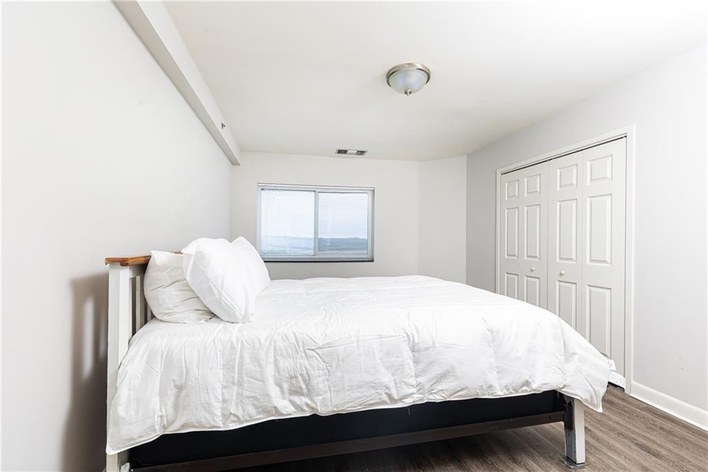 1501 Clairmont Road, Unit 1525 Decatur, GA 30033 - Photo 10 of 26 a bedroom with a bed and a window