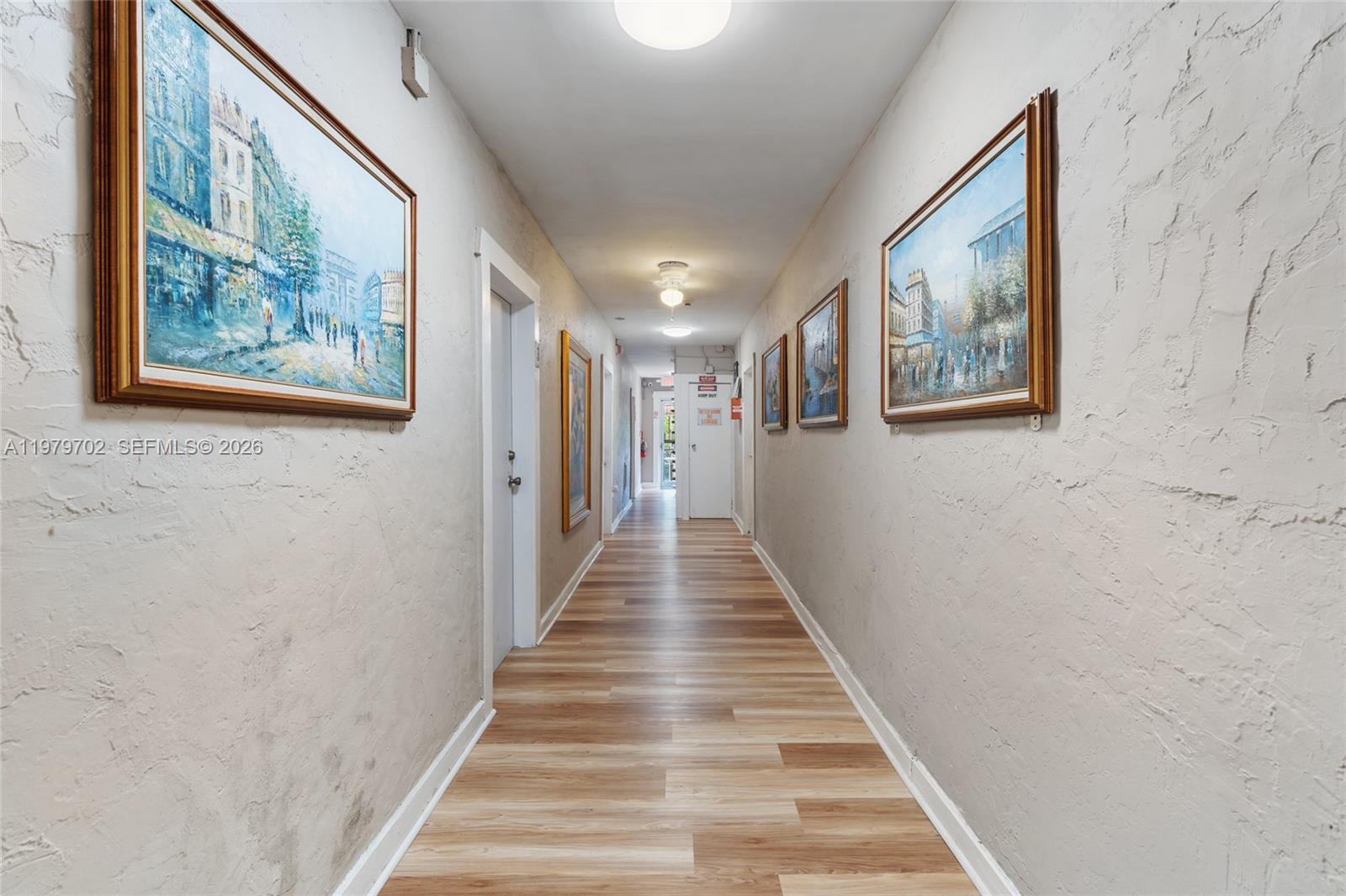 3409 South Le Jeune Road Coral Gables, FL 33134 - Photo 37 of 53 a view of staircase with wooden floor