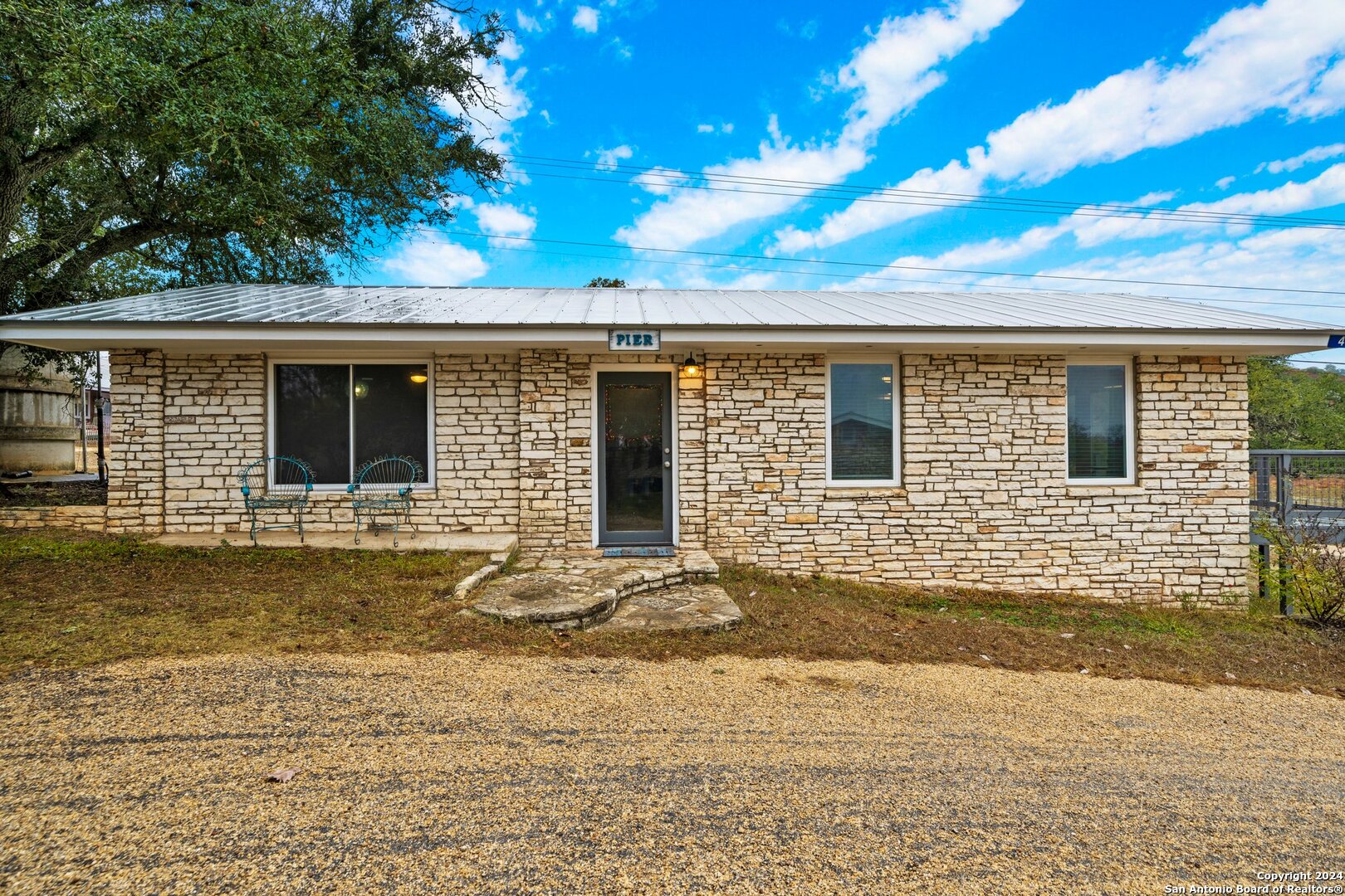 820 Highway 39, Unit 4 Ingram, TX 78025 - Photo 1 of 1 a view of a house with backyard of the house