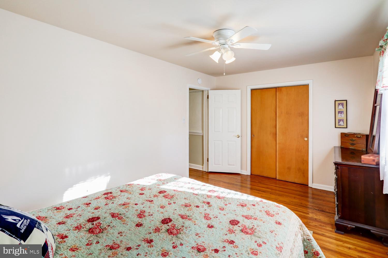 341 Maxson Road Lancaster, PA 17601 - Photo 19 of 32 a bedroom with a bed and wooden floor