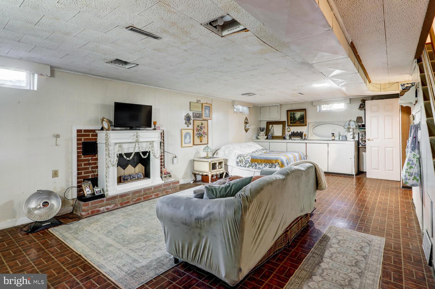 341 Maxson Road Lancaster, PA 17601 - Photo 20 of 32 a living room with furniture and a flat screen tv
