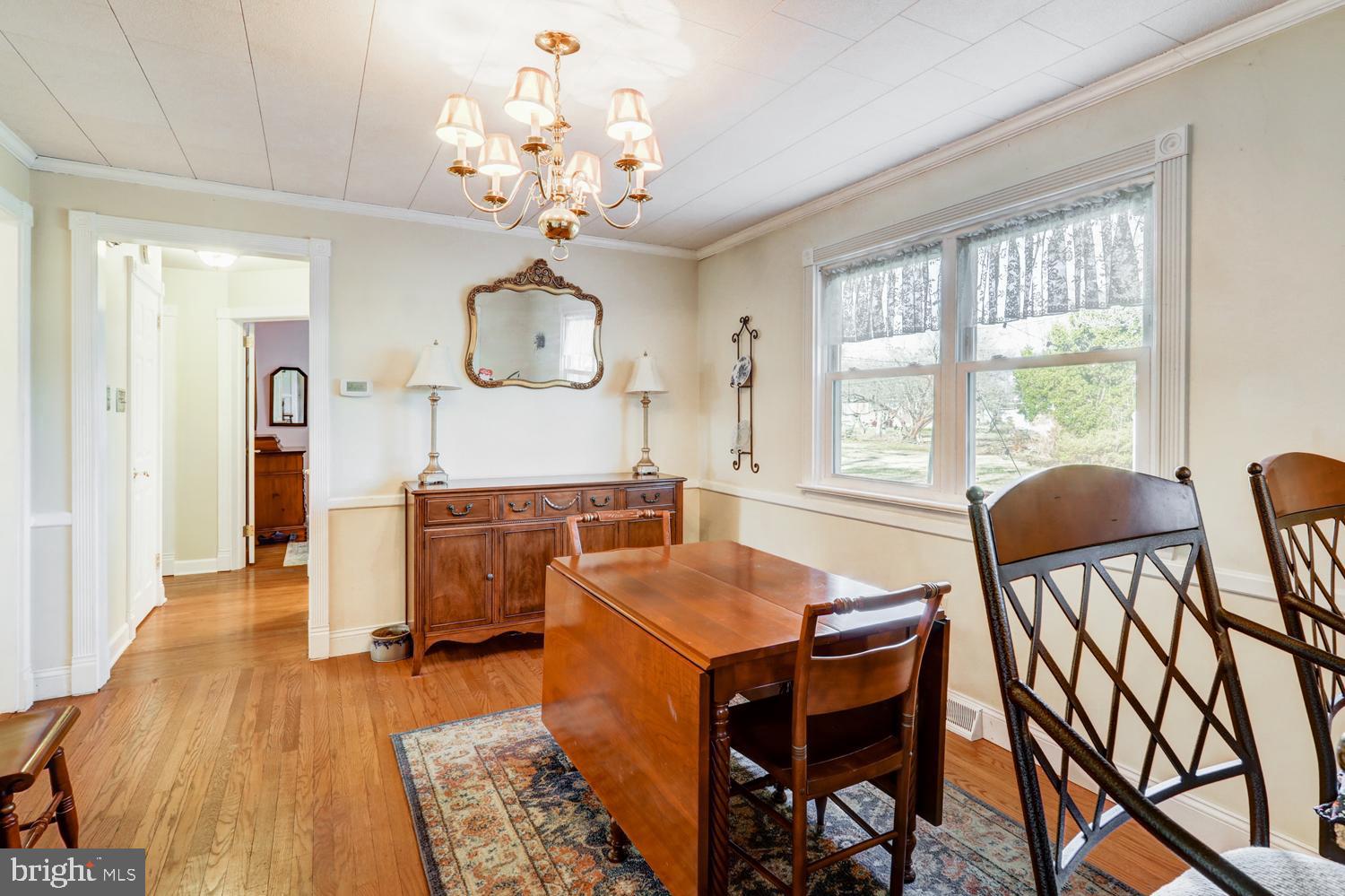 341 Maxson Road Lancaster, PA 17601 - Photo 7 of 32 a view of a dining room with furniture and a chandelier