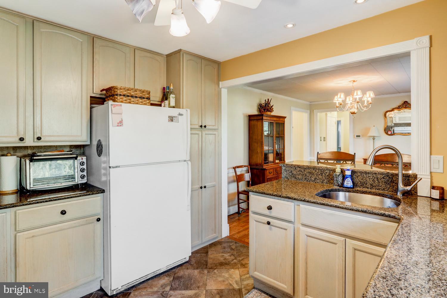 341 Maxson Road Lancaster, PA 17601 - Photo 10 of 32 a kitchen with refrigerator and cabinets