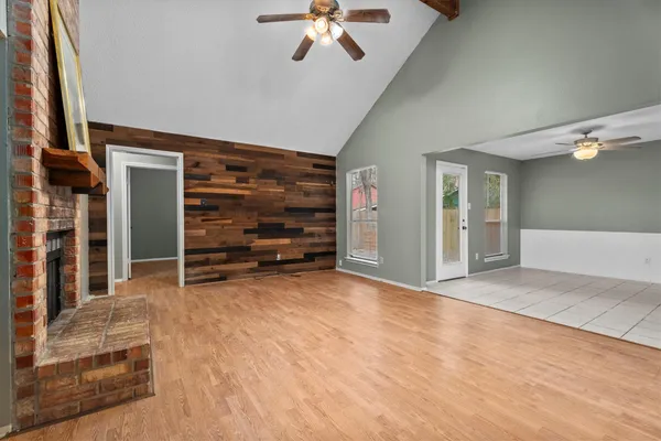 wooden floor and window in an empty room