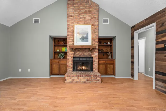 a view of a livingroom with a fireplace