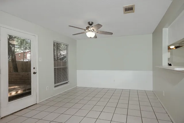 a view of an empty room and window