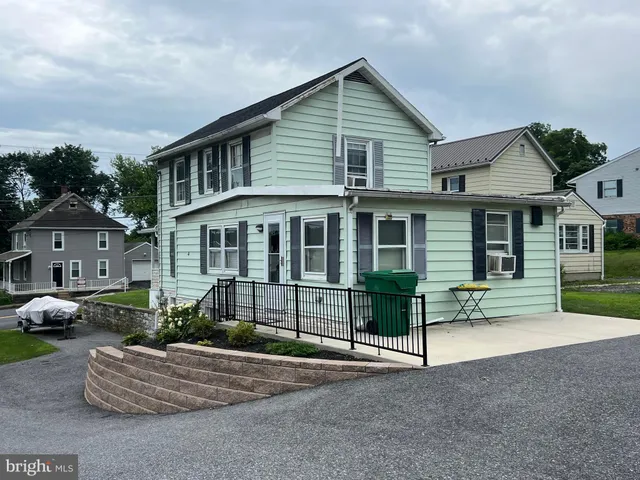 a view of a house with a patio