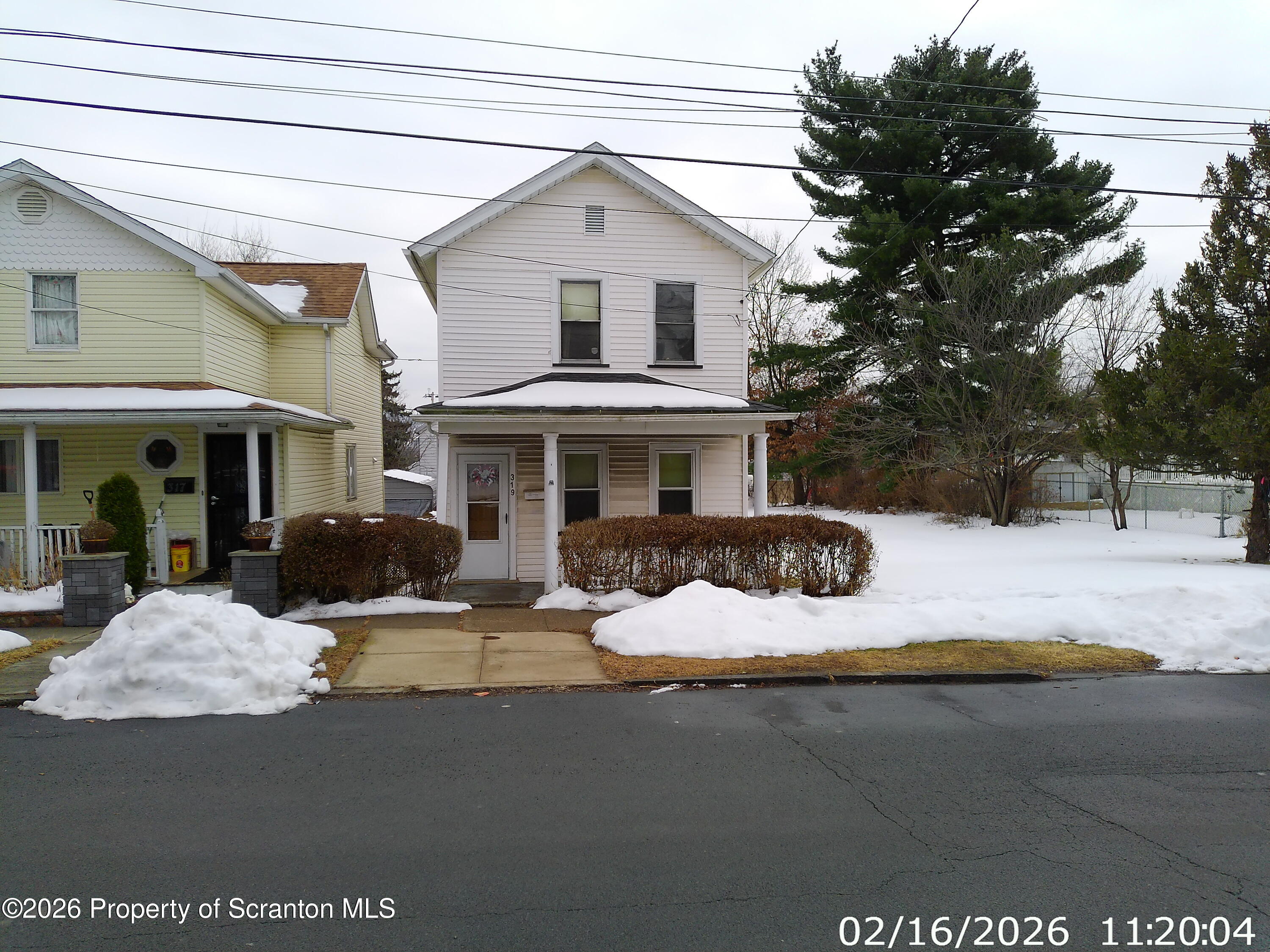319 South 9th Avenue Scranton, PA 18504 - Photo 1 of 49 a house that has a tree in front of it