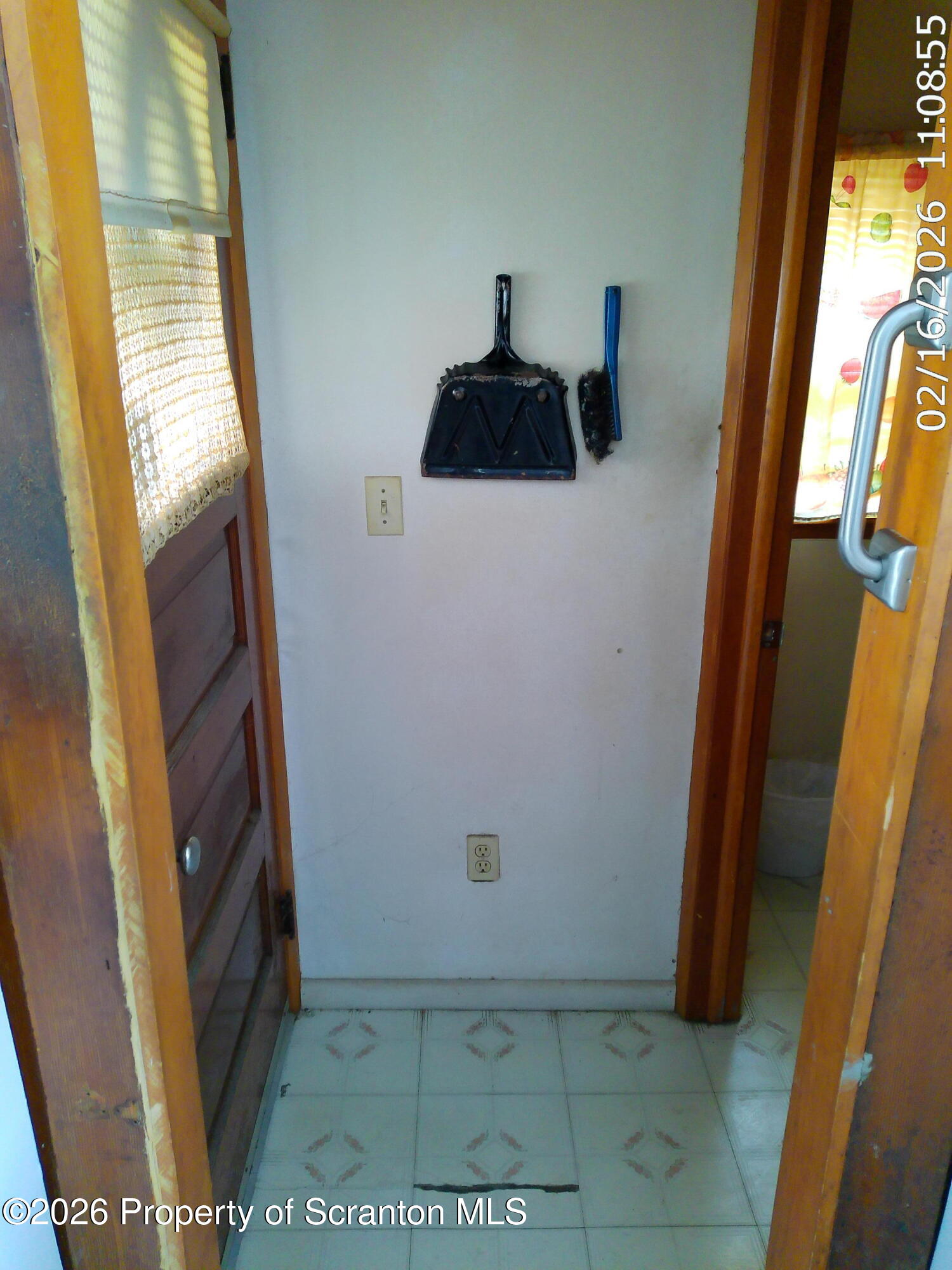 319 South 9th Avenue Scranton, PA 18504 - Photo 14 of 49 a white refrigerator freezer and a stove sitting inside of a window