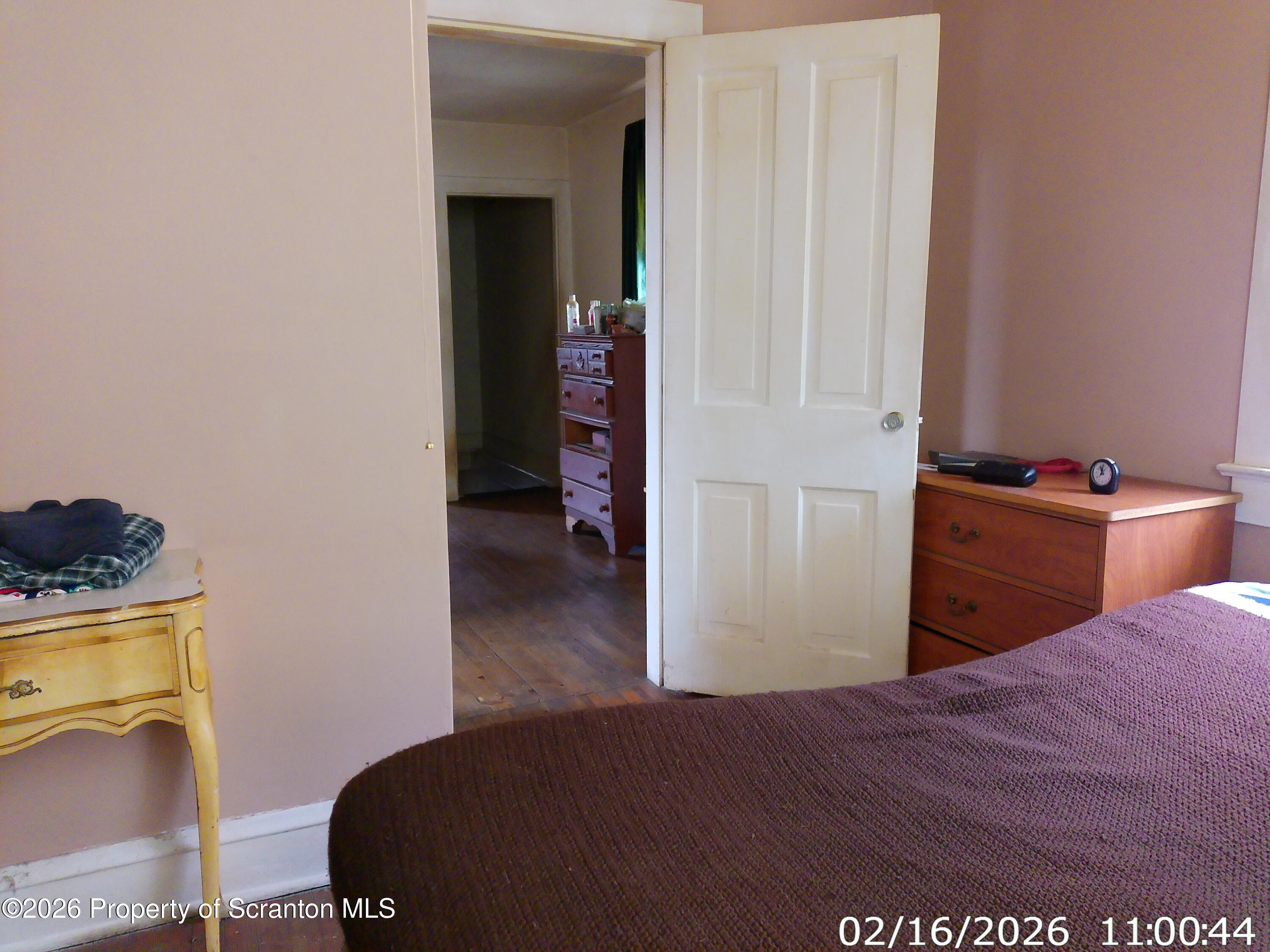 319 South 9th Avenue Scranton, PA 18504 - Photo 17 of 49 a bedroom with a bed and a cabinets
