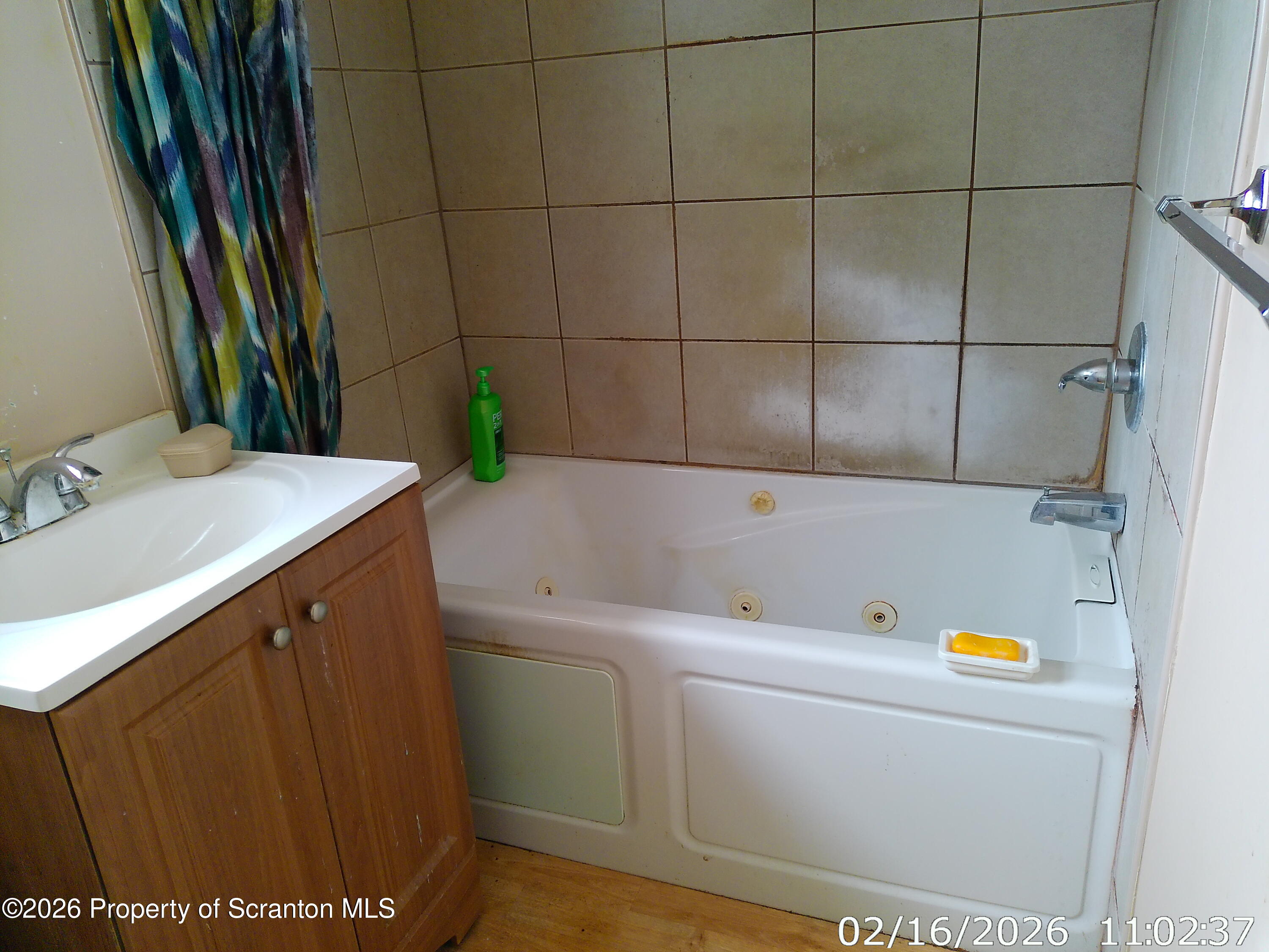 319 South 9th Avenue Scranton, PA 18504 - Photo 20 of 49 a bathroom with a sink and a bathtub