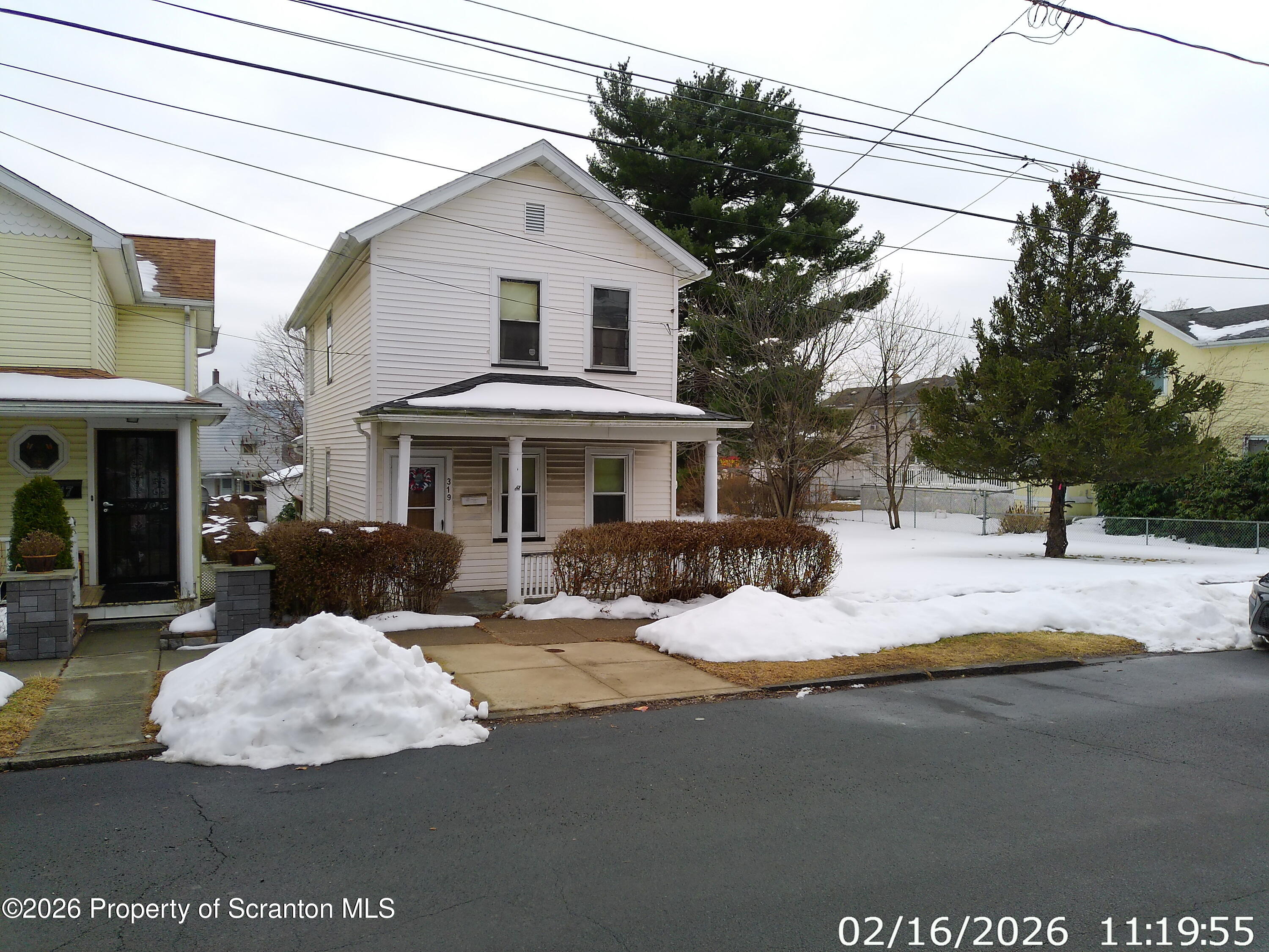319 South 9th Avenue Scranton, PA 18504 - Photo 2 of 49 a view of a white house with a large tree