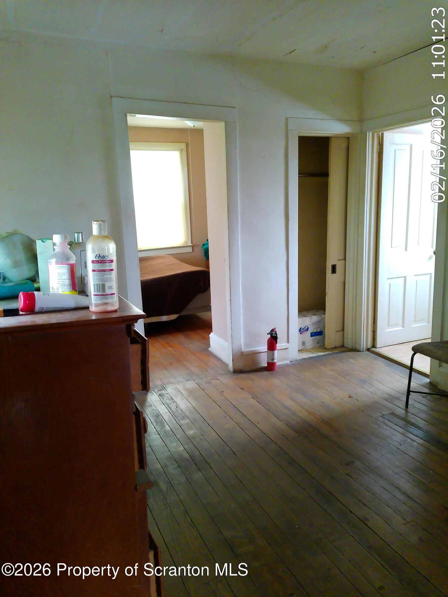 319 South 9th Avenue Scranton, PA 18504 - Photo 21 of 49 a living room with furniture and a window