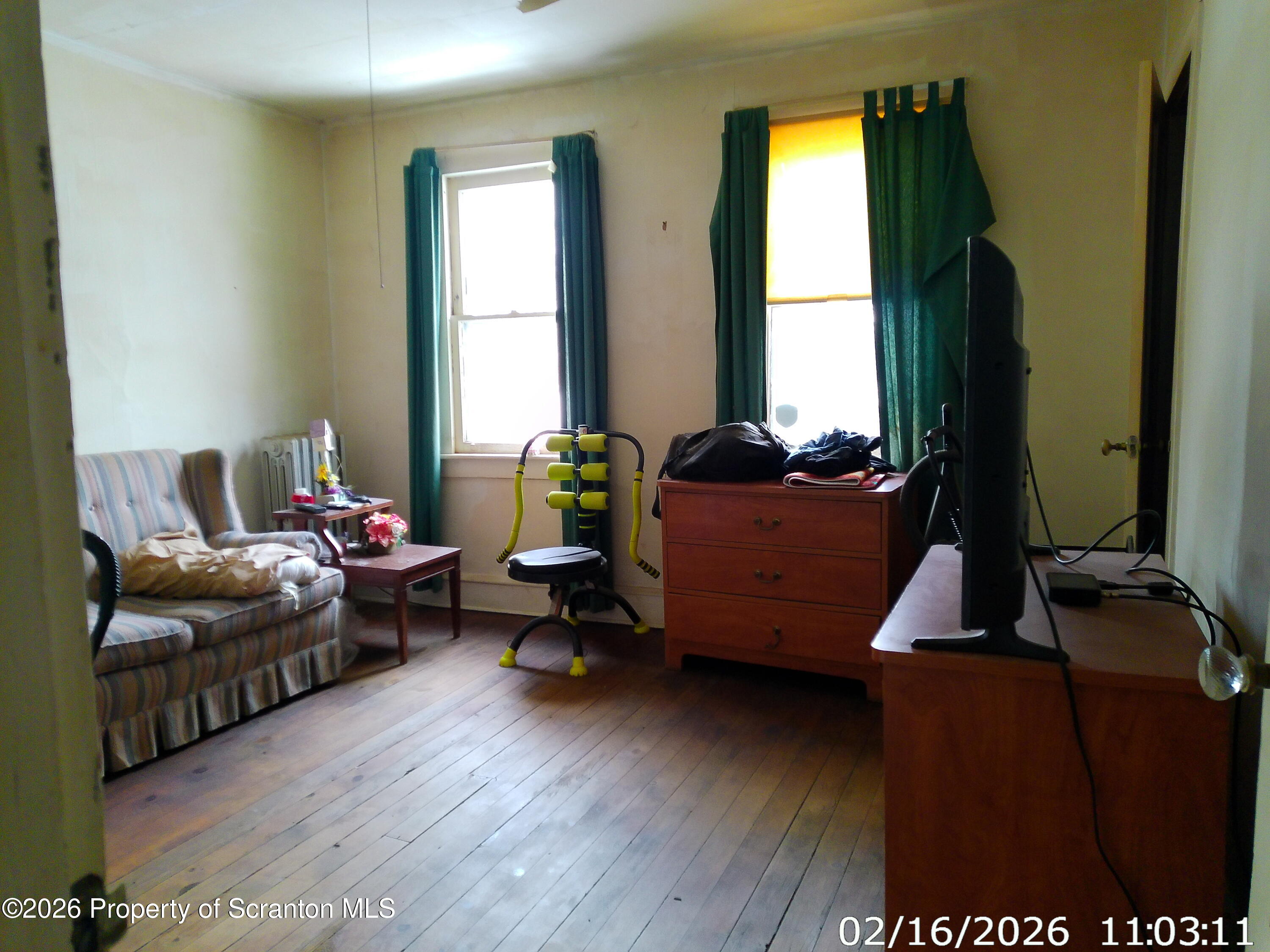 319 South 9th Avenue Scranton, PA 18504 - Photo 24 of 49 a living room with furniture and a window