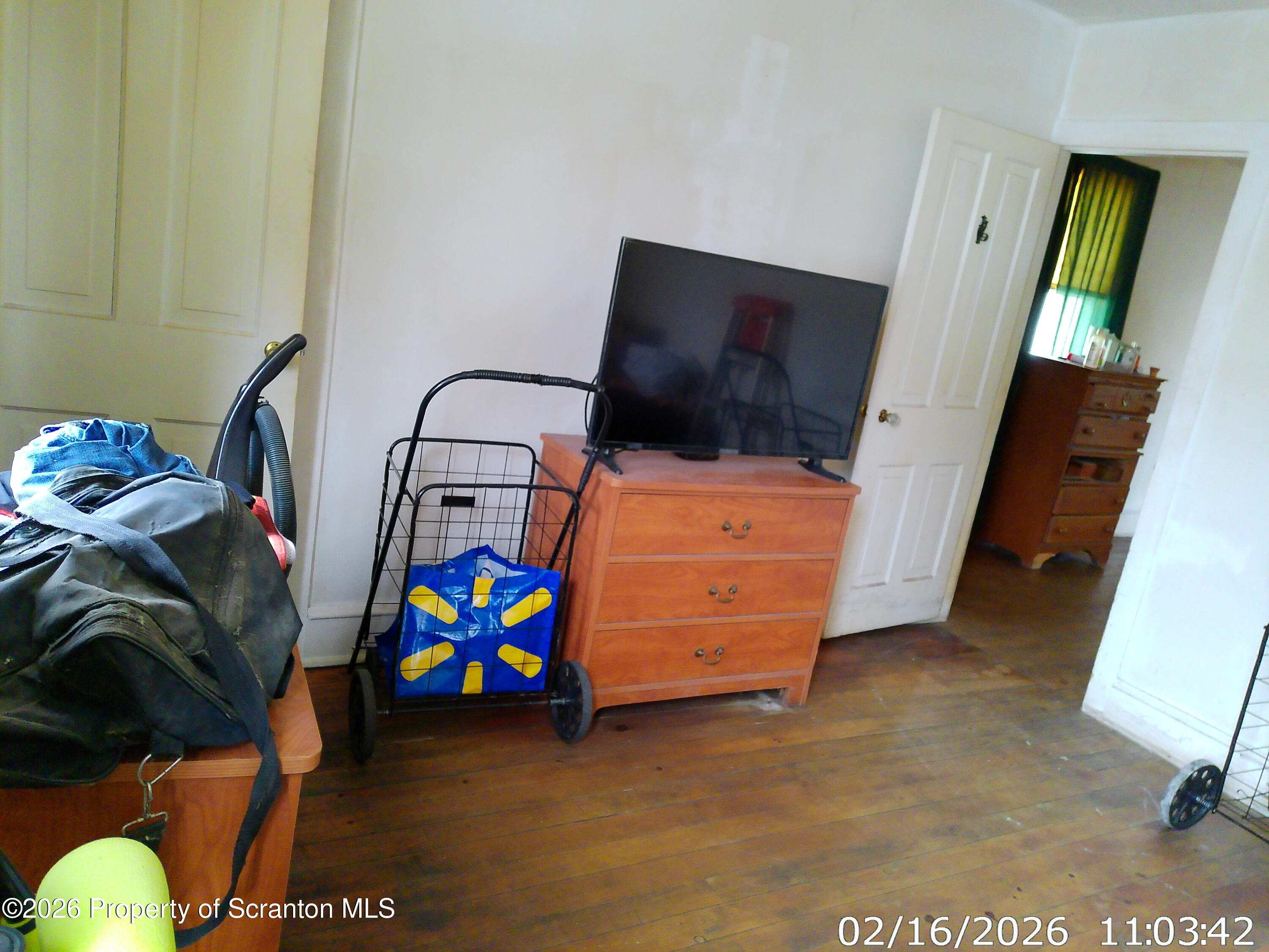 319 South 9th Avenue Scranton, PA 18504 - Photo 26 of 49 a living room with furniture and a flat screen tv
