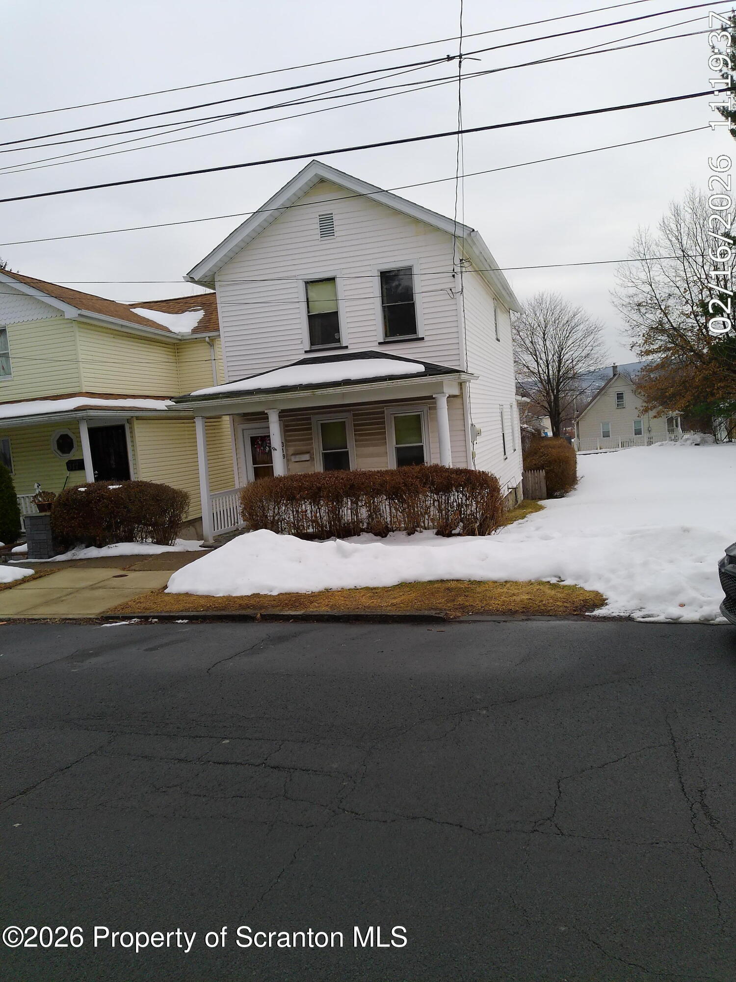 319 South 9th Avenue Scranton, PA 18504 - Photo 3 of 49 a front view of a house with a yard