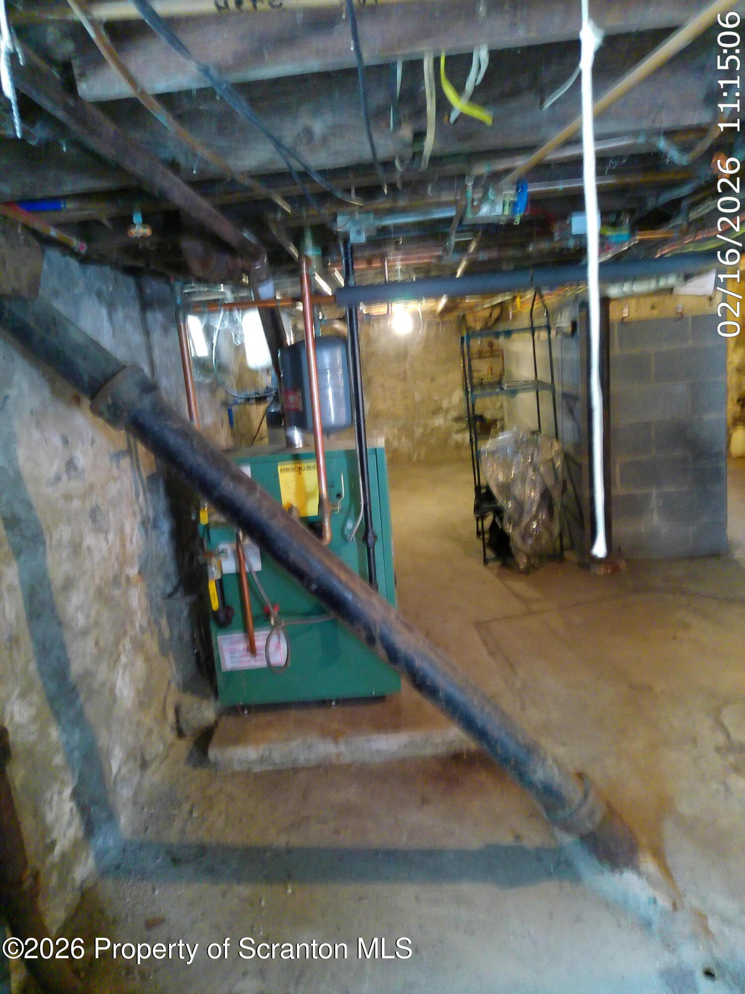 319 South 9th Avenue Scranton, PA 18504 - Photo 45 of 49 a view of an empty room with wooden floor