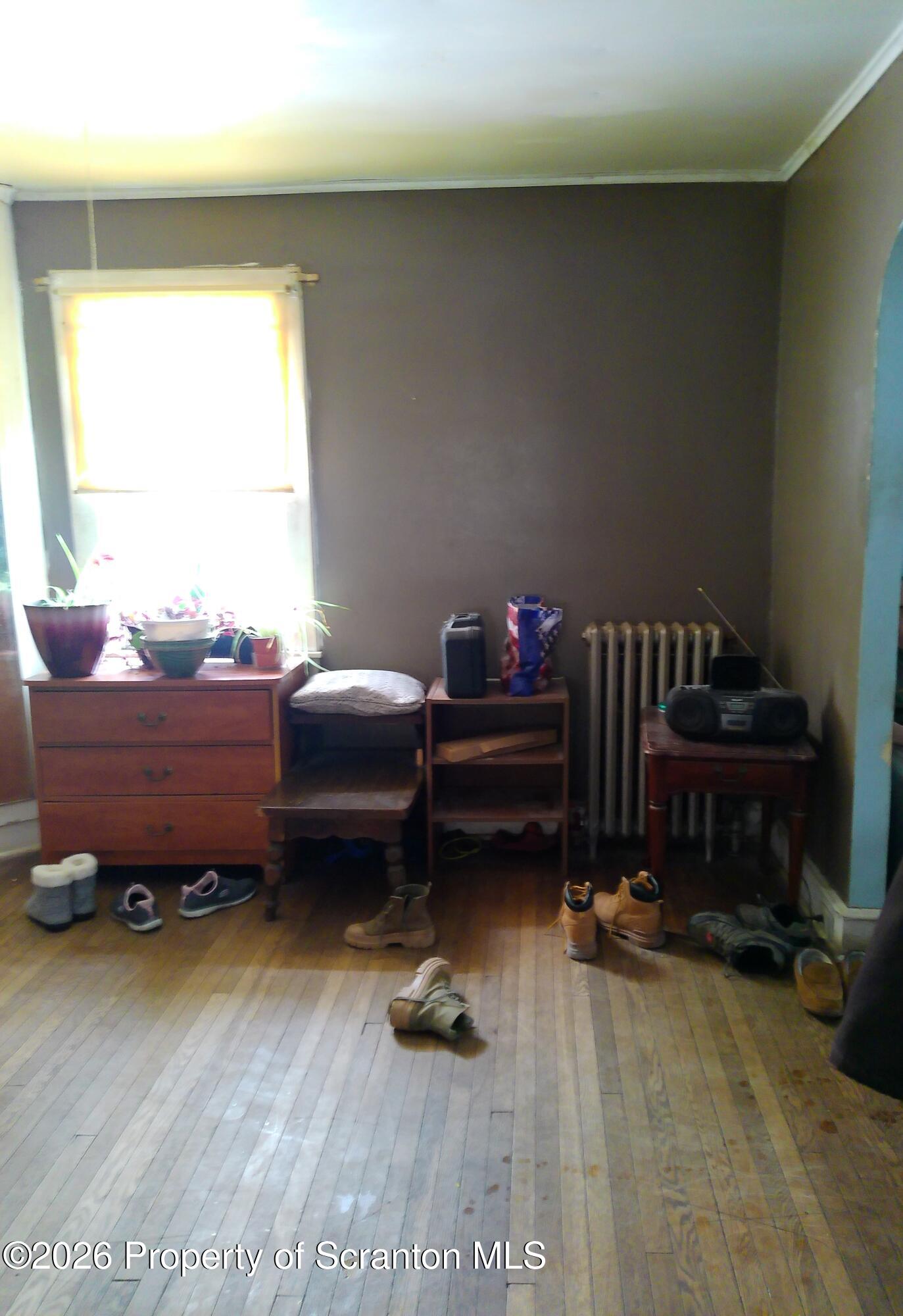 319 South 9th Avenue Scranton, PA 18504 - Photo 6 of 49 a living room with furniture and a window