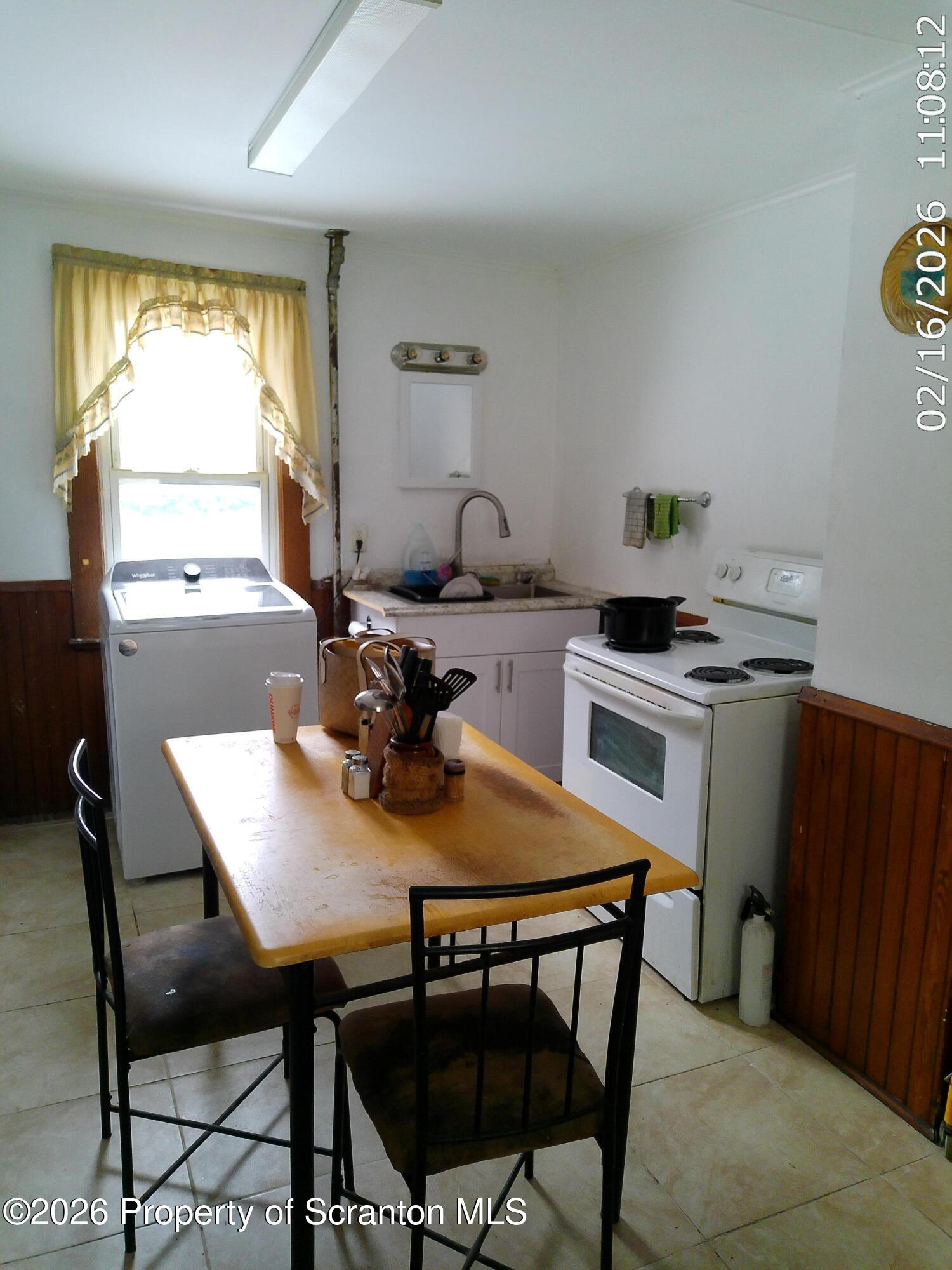 319 South 9th Avenue Scranton, PA 18504 - Photo 8 of 49 a view of a dining room with furniture and window
