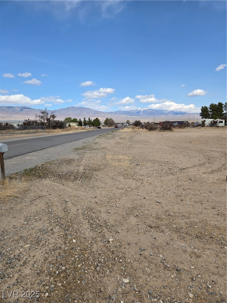 3331 West Simkins Road Pahrump, NV 89060 - Photo 1 of 6 View of street featuring a mountain view