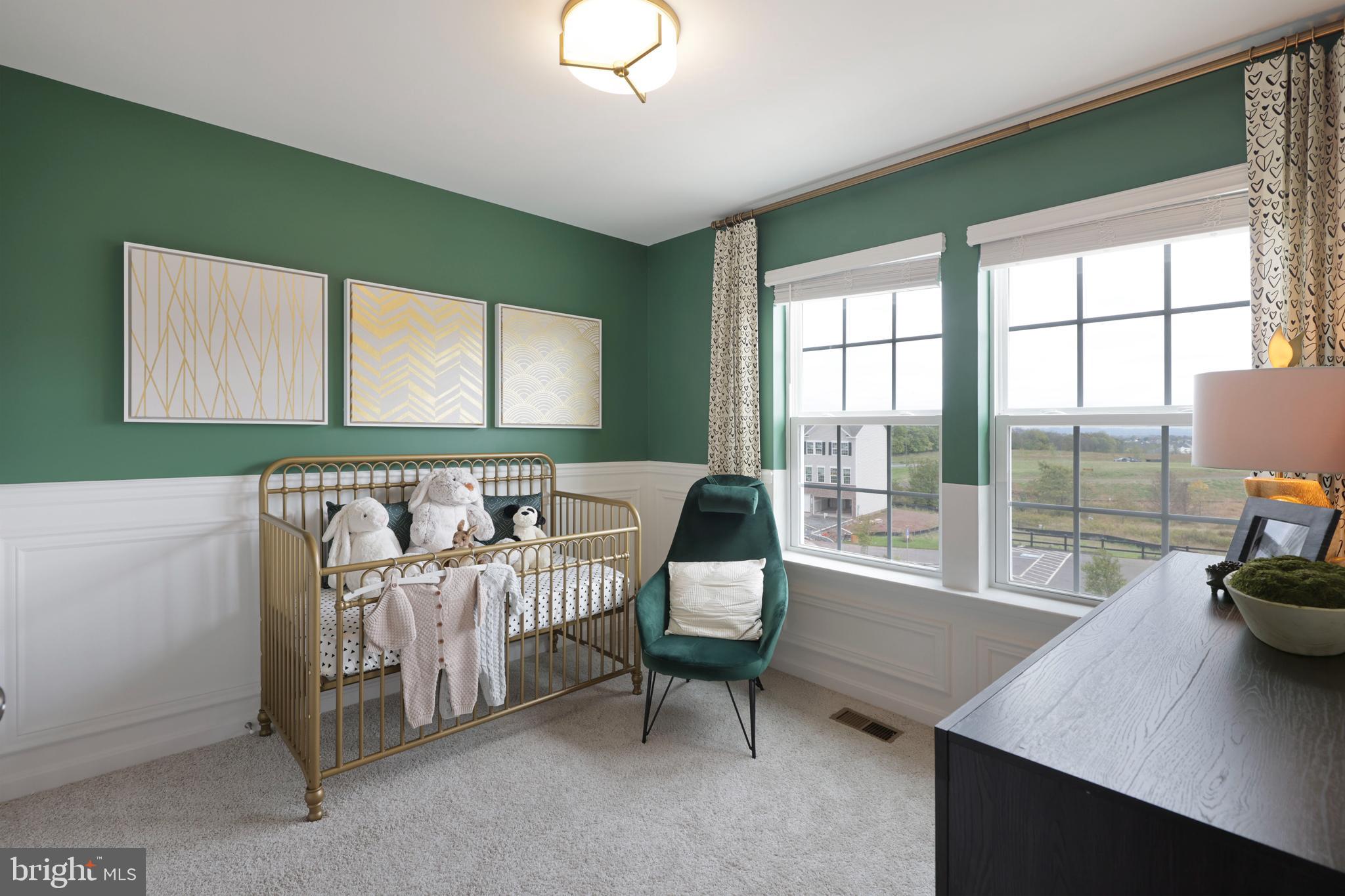 1271 Apollo Drive Frederick, MD 21702 - Photo 25 of 35 a living room with furniture and a potted plant