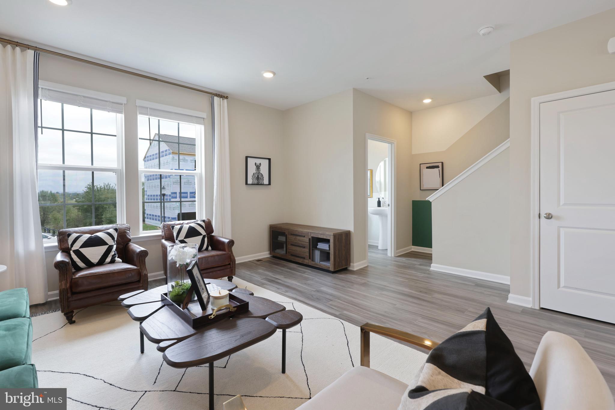 1271 Apollo Drive Frederick, MD 21702 - Photo 5 of 35 a living room with furniture and a large window