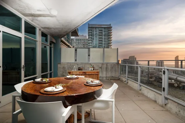 a outdoor dining space with furniture and outdoor view