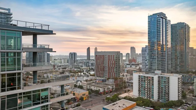 a front view of a building with a balcony