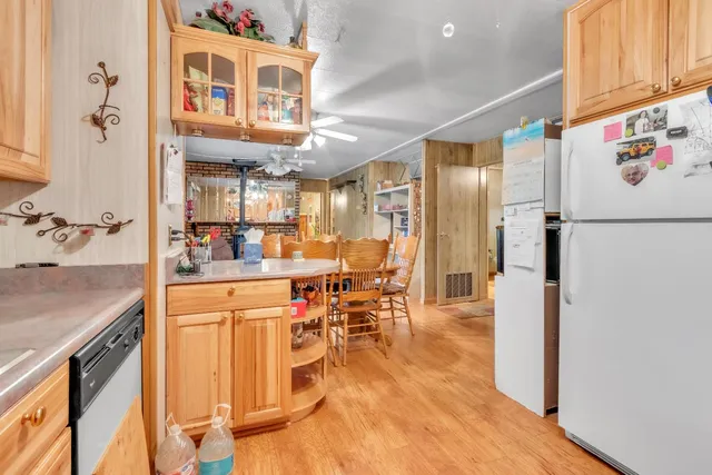 a bed room with a bed and a chandelier