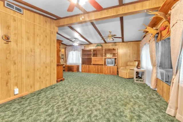 a white refrigerator freezer sitting in a kitchen