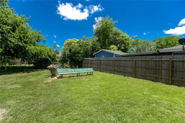 a view of a garden with a slide