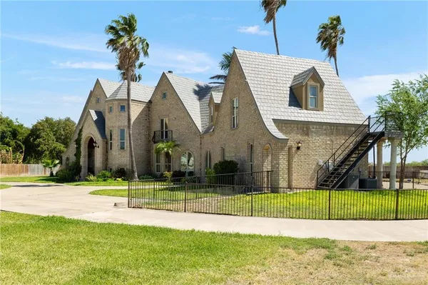 a view of a house with a swimming pool
