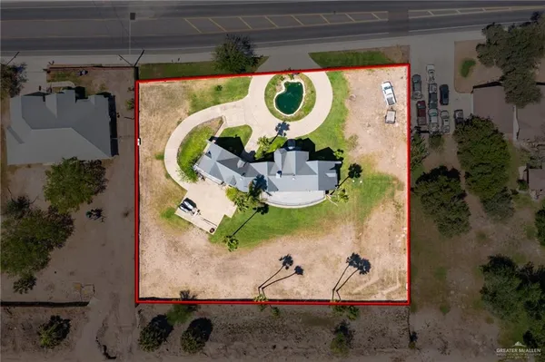 an aerial view of residential house with outdoor space