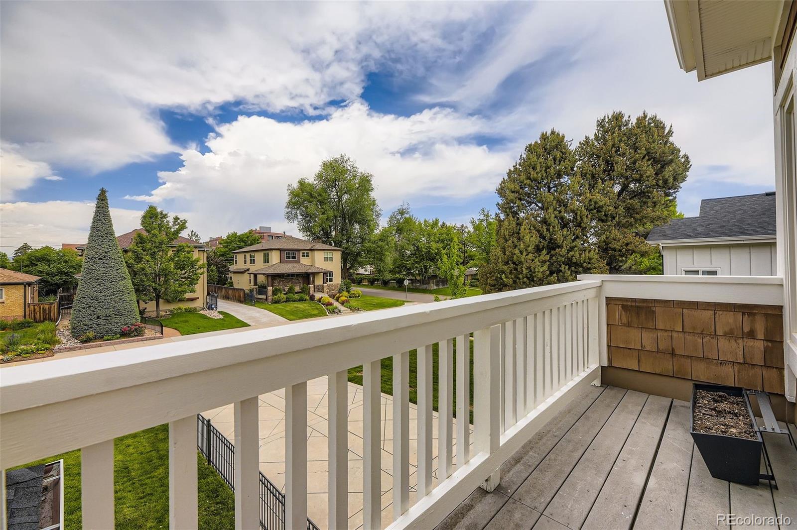 940 Kearney Street Denver, CO 80220 - Photo 35 of 49 a view of a balcony with wooden fence