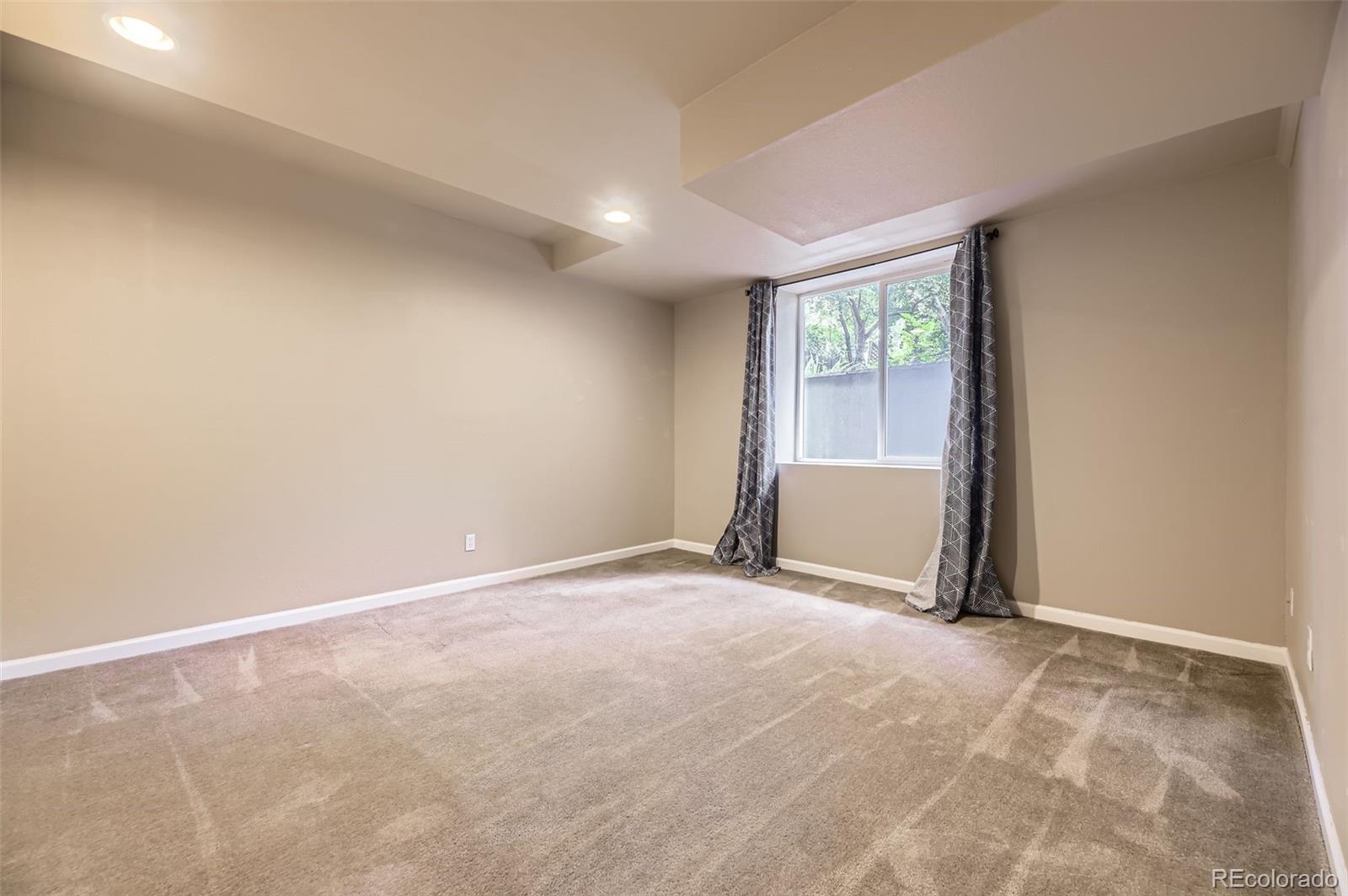 940 Kearney Street Denver, CO 80220 - Photo 40 of 49 an empty room with a window