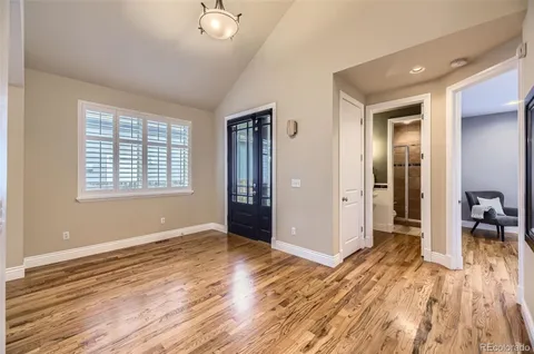 a view of livingroom with hardwood floor and hallway