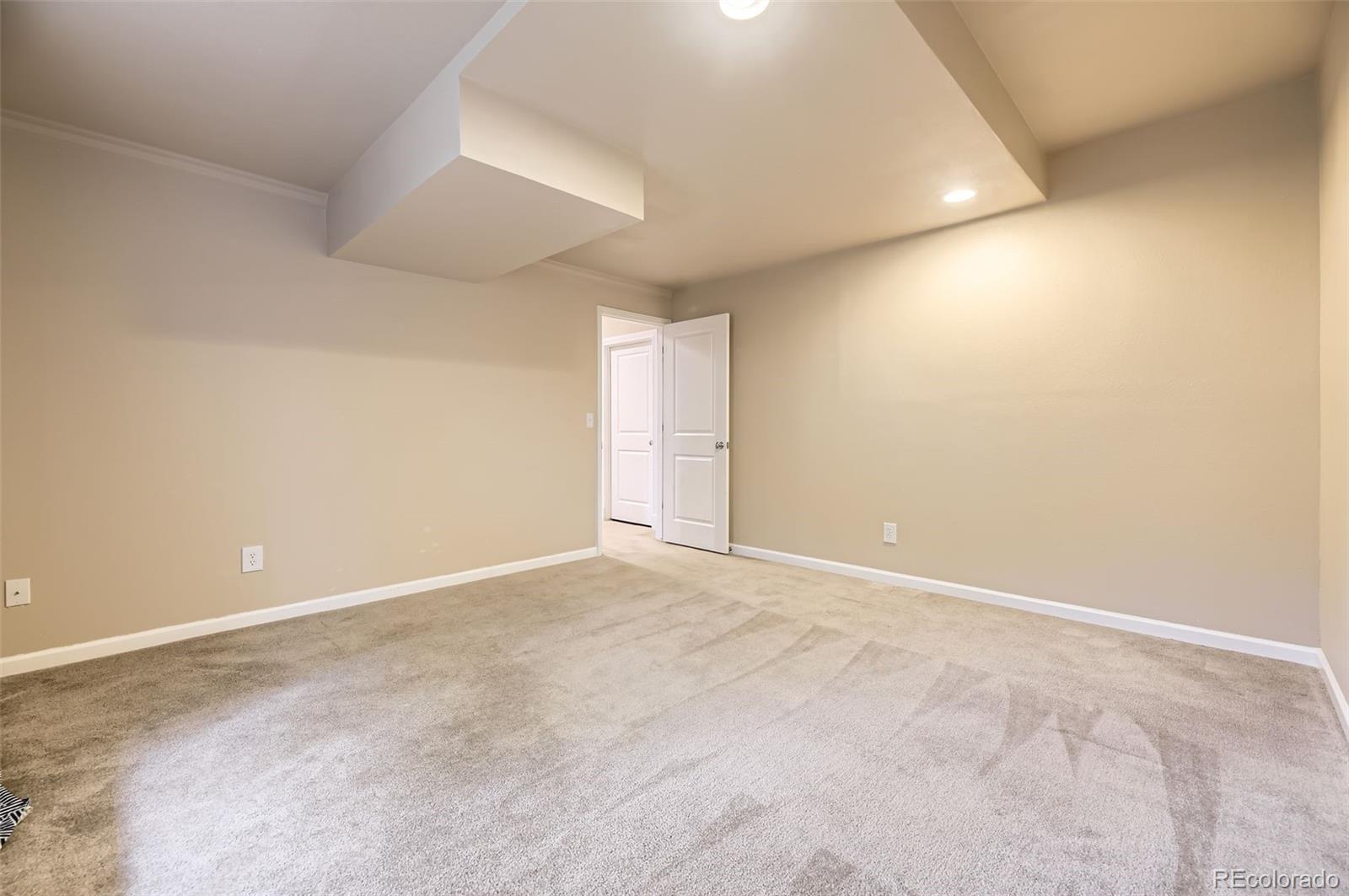 940 Kearney Street Denver, CO 80220 - Photo 41 of 49 an empty room with a natural light