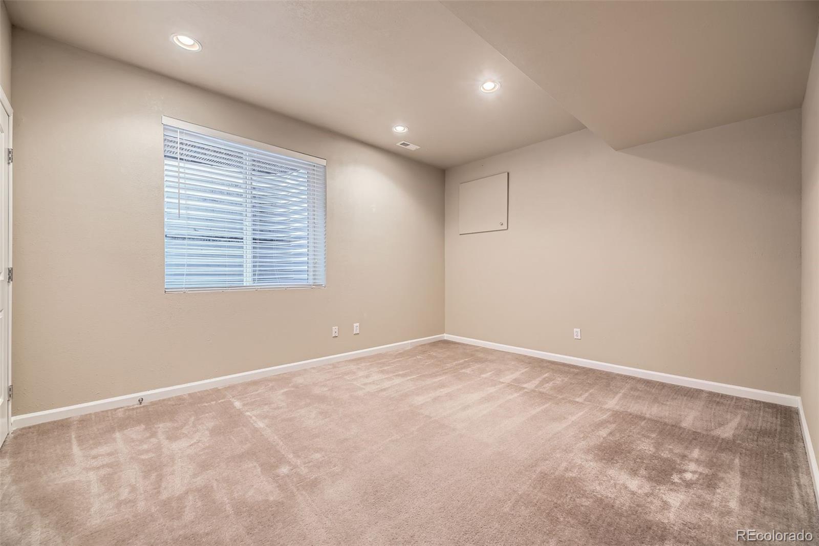940 Kearney Street Denver, CO 80220 - Photo 45 of 49 a view of an empty room with a window