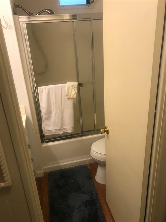 11076 100th Street, Unit 41 Largo, FL 33773 - Photo 10 of 17 a bathroom with a sink and a toilet