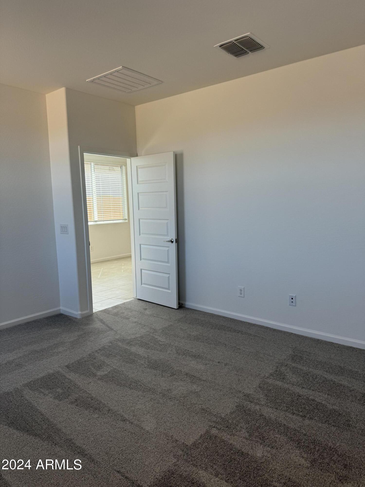 12088 East Verbina Lane Florence, AZ 85132 - Photo 15 of 48 a view of an empty room