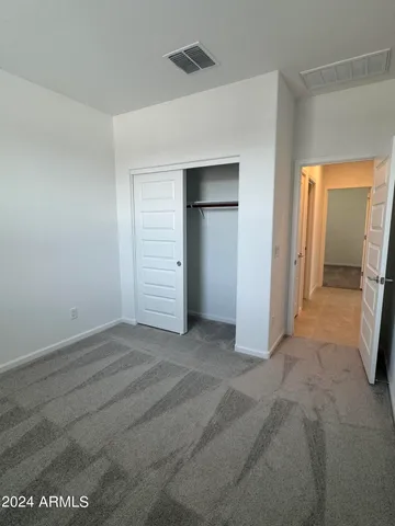 a view of a swimming pool with a bench