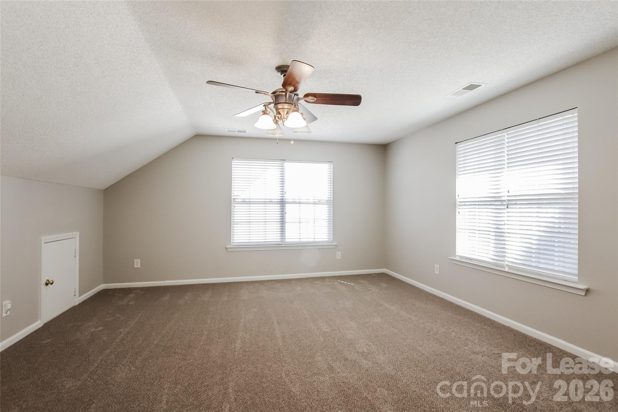 10802 Gold Pan Road Charlotte, NC 28215 - Photo 12 of 15 a view of an empty room with a window