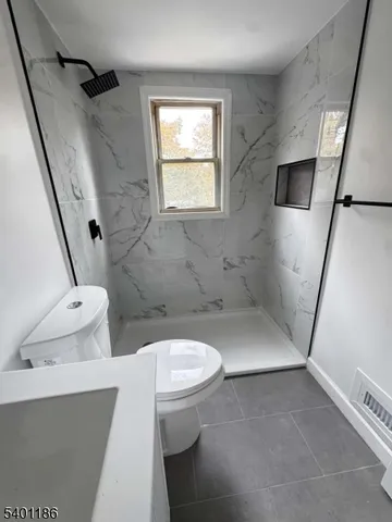 a bathroom with a sink and toilet