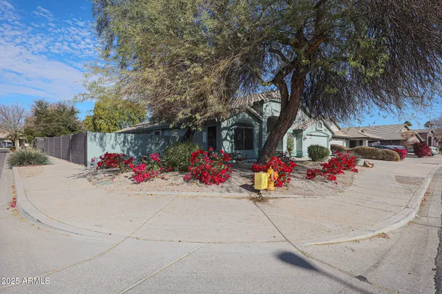 a front view of a house with a garage