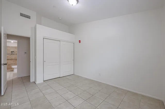 a spacious bathroom with a bathtub and a shower