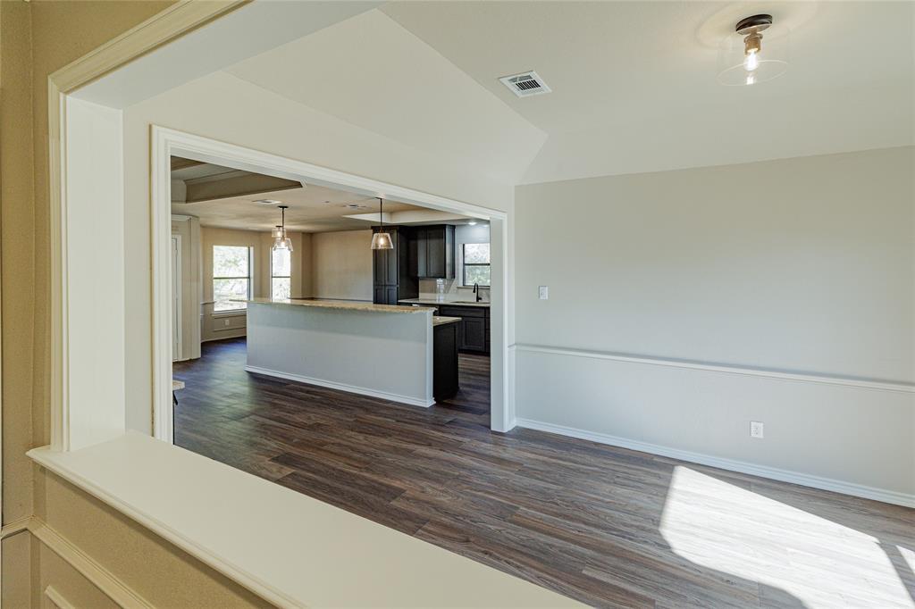 1376 County Road 4651 Rhome, TX 76078 - Photo 13 of 39 Looking into formal dining standing at the entrance.