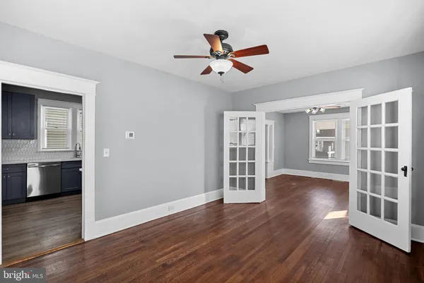 a kitchen with a sink a window and appliances