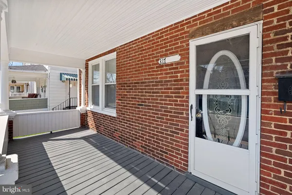 a view of a house with a door and a window
