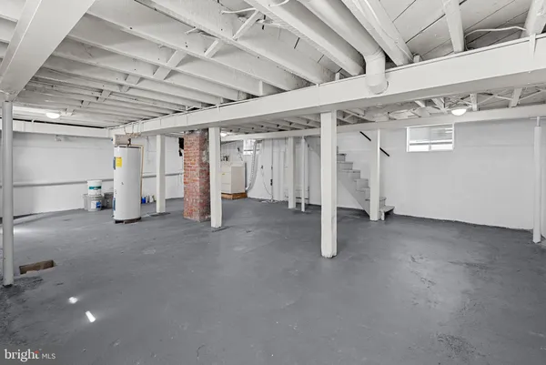 a picture of a cabinet with a white wall and white picture
