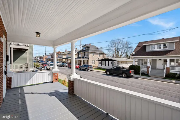 a view of a hallway with washer and dryer
